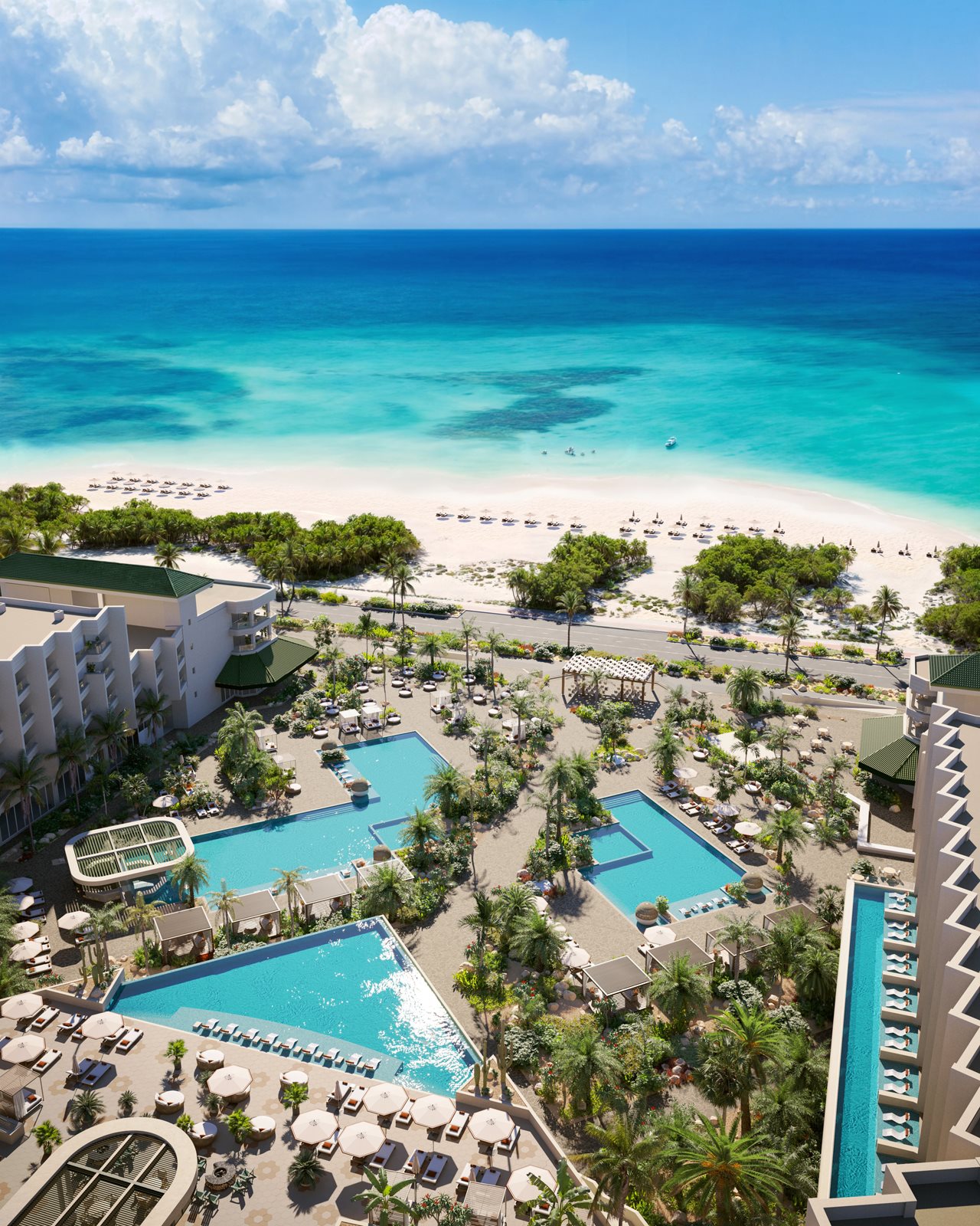 Views of ocean beach and pool side at an Aruba hotel