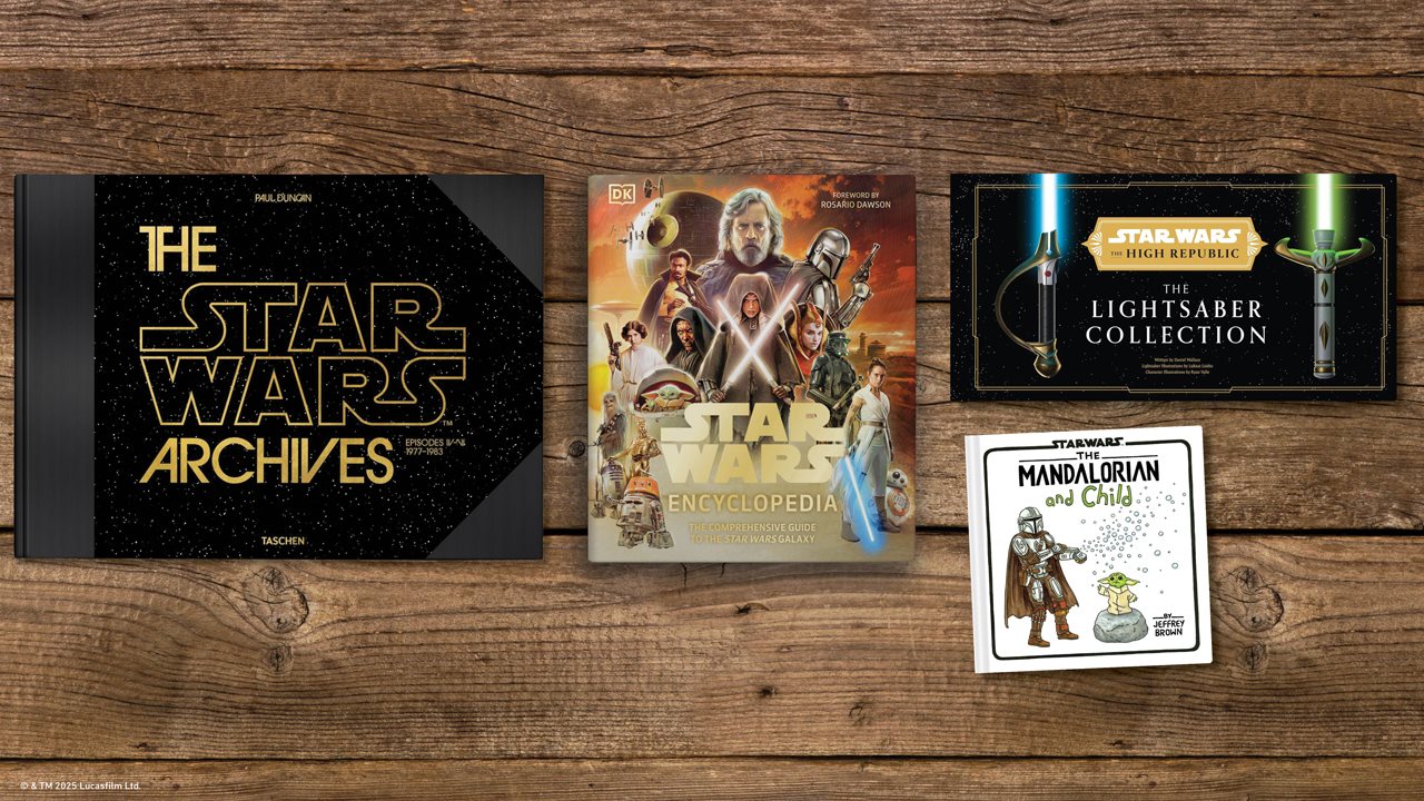 Books on a table called: The Star Wars Archives, Star Wars Encyclopedia, The Lightsaber Collection, and The Mandalorian and Child
