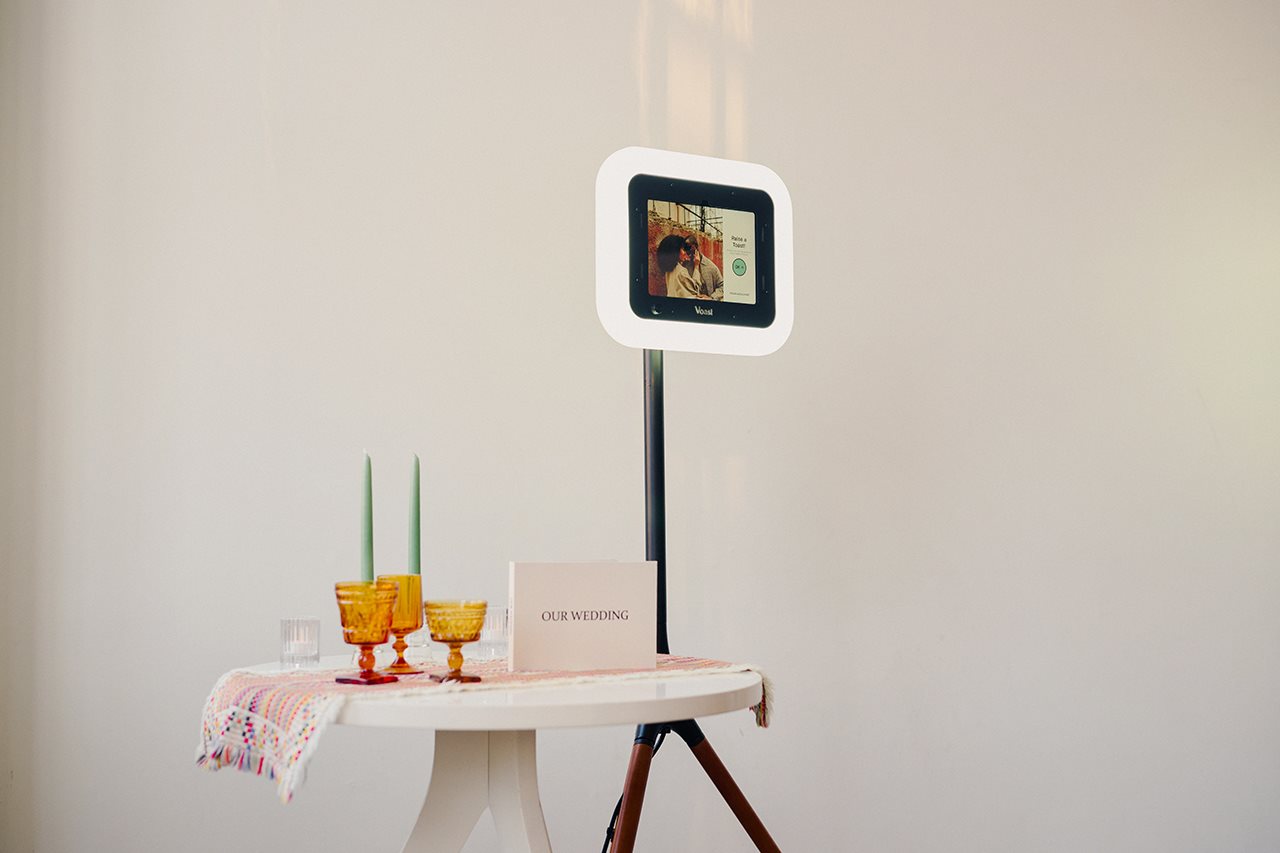 Voast video booth camera next to the guest book table