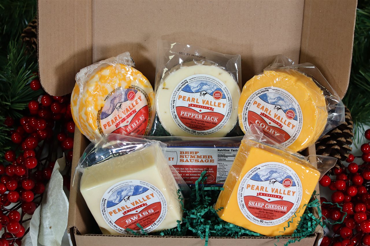 The Pearl Valley Party Pack Box includes a delicious cheesy assortment: Mild Swiss, Colby, Marble, Pepper Jack and Sharp Colored Cheddar.