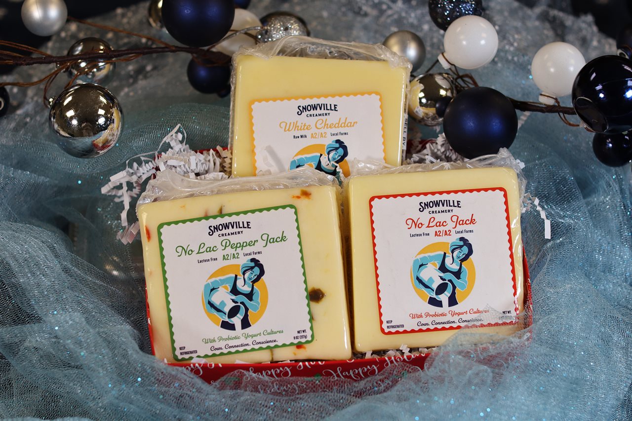 Snowville Creamery's Southeast Ohio Cheese Sampler includes their White Cheddar, No Lac Jack and No Lac Pepper Jack Cheese.