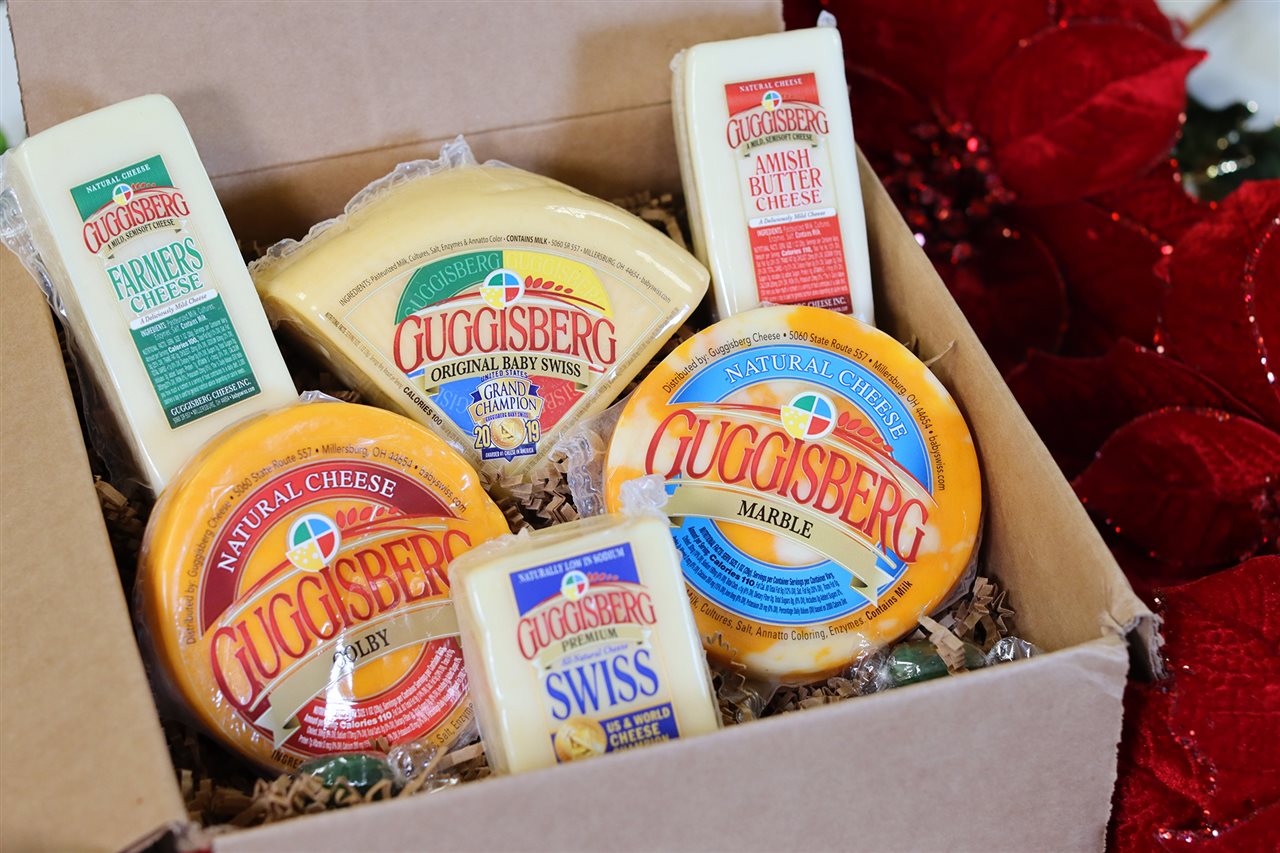 Guggisburg - The Doughty sampler gift package features a wedge of Guggisberg's Original Baby Swiss, mini rounds of Marble and Colby and smaller chunks of Farmers Cheese, Amish Butter Cheese and world-famous Premium Swiss.