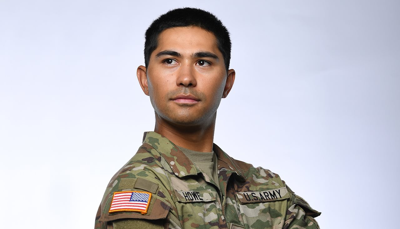 Private 1st Class Spencer Howe wearing camo-fatigues, used the resilience and determination he learned in the Army to make his Games debut.